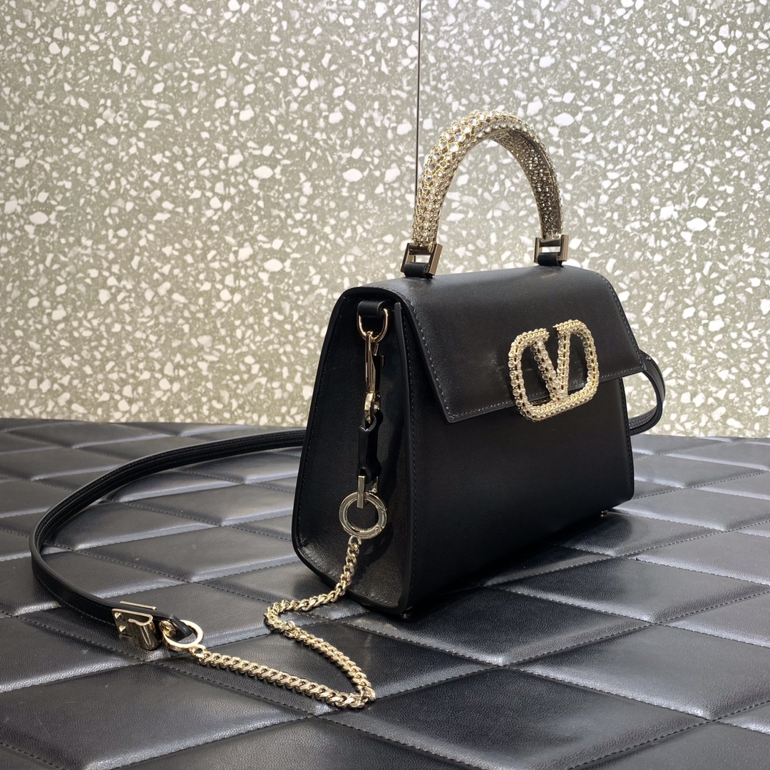 Valentino Garavani Vsling Small Handbag in Black Grainy Calfskin 